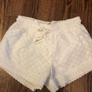 BARELY WORN white lace shorts